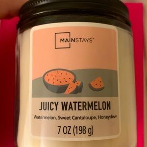 Juicy watermelon candle. Never burned. Smells sweet. One wick, 7 oz.
